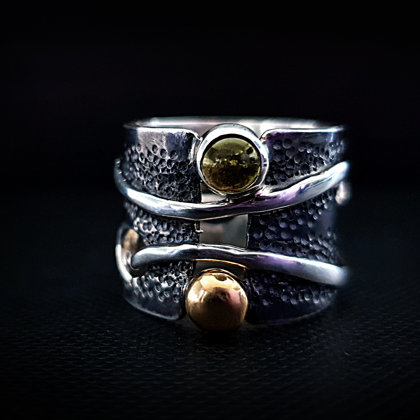 Sterling silver ring with tourmaline and gold bead.