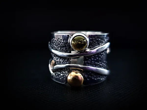 Sterling silver ring with tourmaline and gold bead.